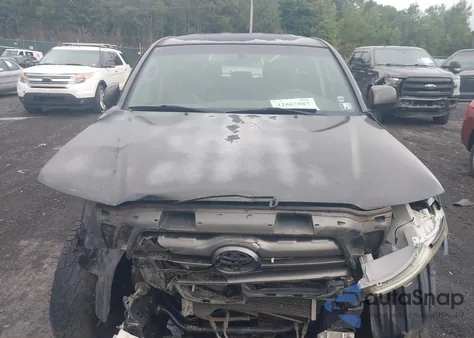 2009 Toyota Tacoma Base V6 z USA, uszkodzony, nr VIN 3TMLU42N89M037857